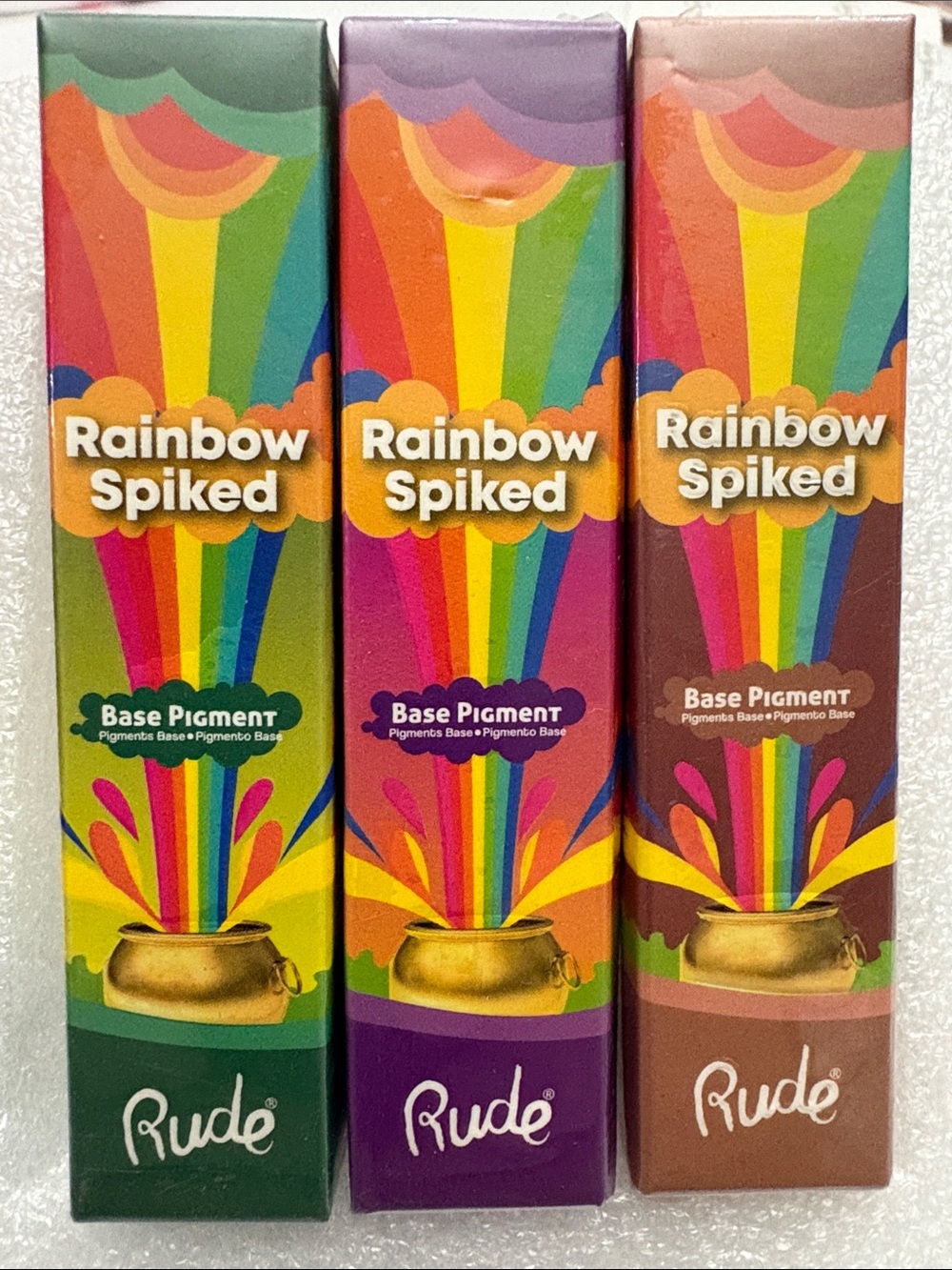 RUDE Rainbow Spiked Base Pigment Trio - Green, Purple, Brown Packaging